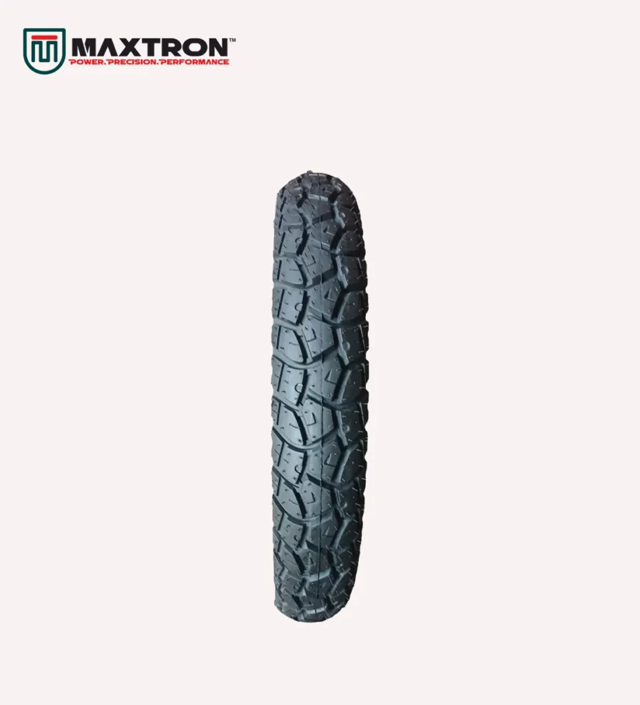 Maxtron M-101 motorcycle tyre with rugged all-terrain tread pattern for superior grip, durability, stability, and long-lasting road performance.