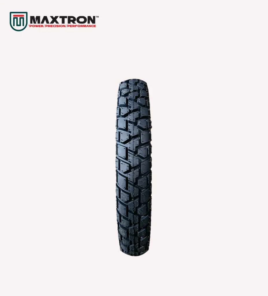 Maxtron M-102 motorcycle tyre featuring an aggressive dual-purpose tread pattern for superior traction, durability, stability, and reliable on-road and off-road performance.