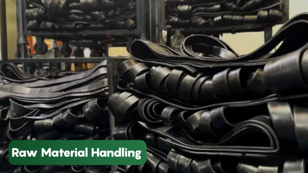 Raw rubber materials and tyre components organized within a manufacturing facility, demonstrating efficient raw material handling and inventory management processes.