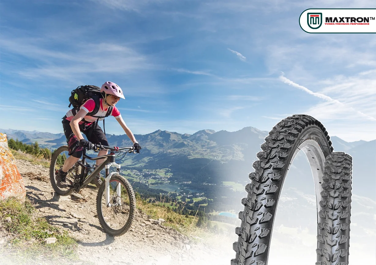 Mountain biker riding on a rugged cross-country trail with premium MTB XC bicycle tyres featuring aggressive tread patterns for superior traction, durability, and off-road performance.