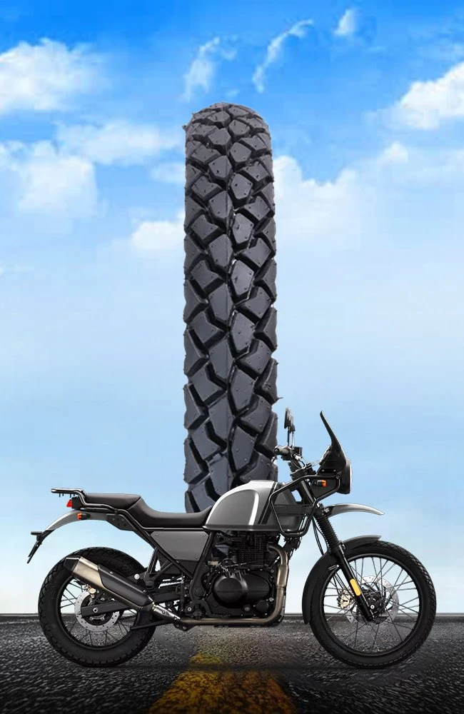 Adventure motorcycle with rugged dual-sport tyre featuring aggressive tread pattern for superior off-road traction, stability, durability, and all-terrain performance.