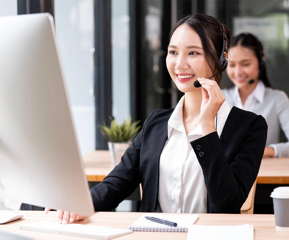 Customer support representatives assisting clients through professional service channels, showcasing Maxtron's commitment to responsive communication, technical assistance and customer satisfaction.