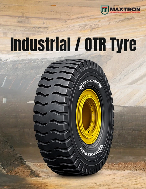 Maxtron Industrial OTR tyre displayed in a mining quarry environment, engineered for heavy-duty off-the-road applications with superior durability, traction and high load-carrying capacity.