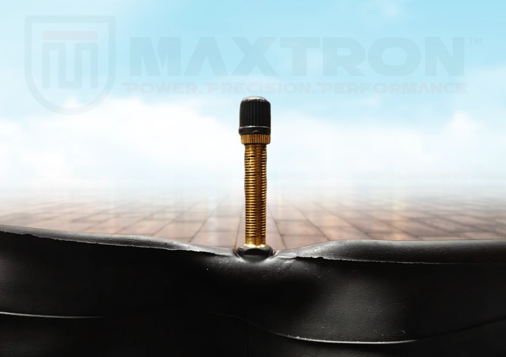 Maxtron moulded bicycle tube with 48mm AV Schrader valve, engineered for superior air retention, leak resistance, and long-lasting cycling performance.