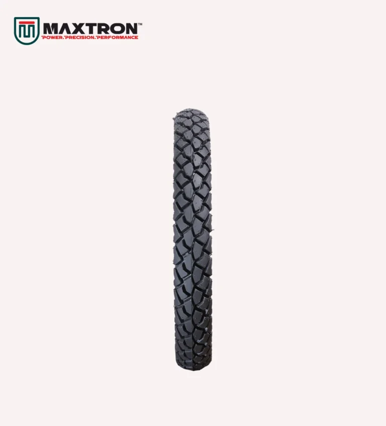 Maxtron M-105 motorcycle tyre with block tread pattern for superior traction, stability, durability, and dependable on-road and mixed-terrain performance.
