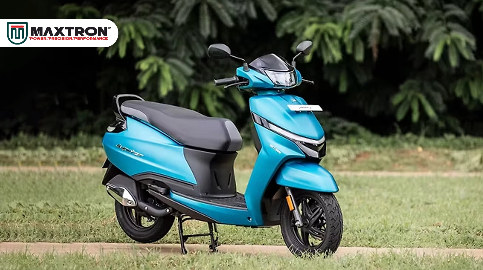 Blue scooter fitted with Maxtron scooter tyres, designed for reliable city commuting with enhanced grip, smooth handling, long-lasting durability and superior riding comfort.