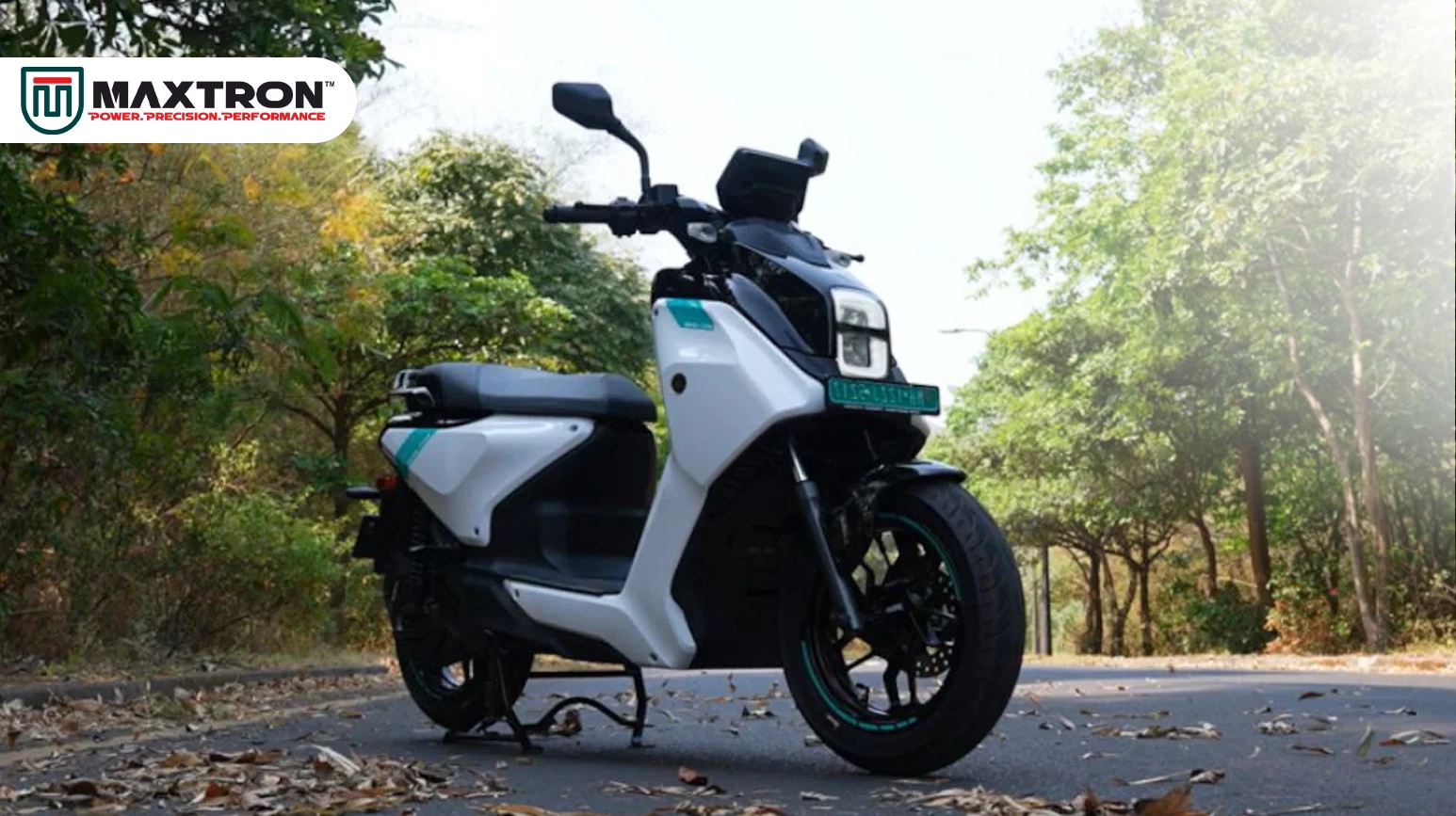 Electric scooter equipped with Maxtron scooter tyres, offering superior grip, low rolling resistance, excellent stability and reliable performance for urban commuting and everyday electric mobility.